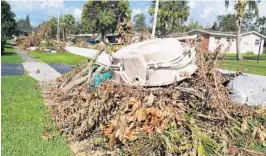  ?? CARLINE JEAN/STAFF FILE ?? Plantation leaders want to charge residents for debris cleanup, saying they want to keep city budget reserves intact.