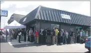  ?? MEDIANEWS GROUP FILE PHOTO ?? A line formed at Herbology in Morton last May ahead of its opening. Only persons with a medical marijuana identifica­tion card may enter and purchase products.