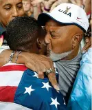  ?? REUTERS ?? Joy: Willie Gatlin embraces his world-champion son