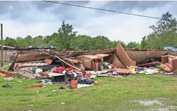  ?? LUCIUS FONTENOT, THE DAILY ADVERTISER, VIA USA TODAY NETWORK ?? Severe thundersto­rms and possibly tornadoes swept through Breaux Bridge, La., west of Baton Rouge, on Sunday. Rain and strong winds are predicted for Monday, the weather service said.