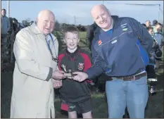  ??  ?? Man of the match, Harry Farrell, with Peter Keogh and Pat Dunne.