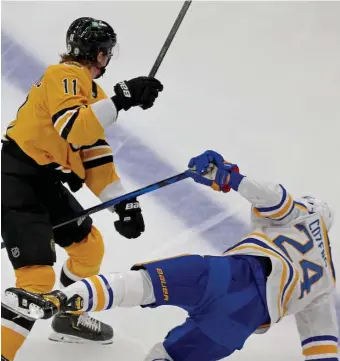  ?? STUART cAHiLL PHOTOs / HERALD sTAFF ?? FILLING IN: Trent Frederic took the place of Brad Marchand on the top line and drilled Buffalo’s Dylan Cozens. Below, Tuukka Rask watches Saturday’s game from Level 9 inside TD Garden.