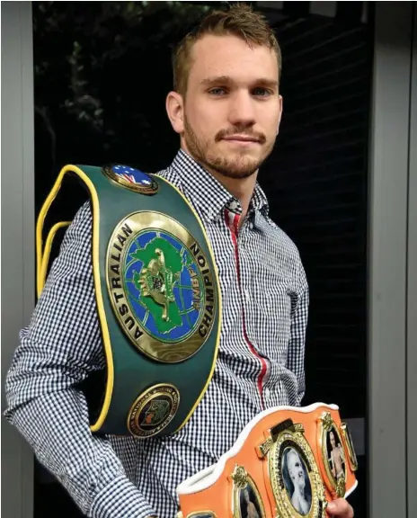  ?? Photo: Bev Lacey ?? THE WORLD AWAITS: Toowoomba’s Australian super lighweight champion Steven Spark at yesterday’ world title bout announceme­nt.