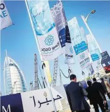  ??  ?? Moving ahead Banners in support of Dubai’s Expo 2020 bid near the Burj Al Arab hotel.
Ahmed Ramzan/ Gulf News