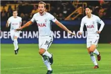  ?? AP ?? Tottenham’s Harry Kane celebrates after scoring his side’s opening goal against Borussia Dortmund.