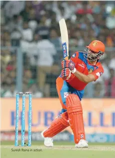  ??  ?? Suresh Raina in action.