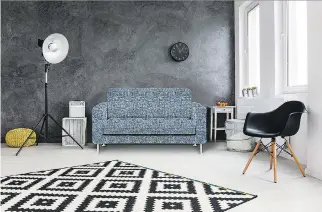  ?? IMAGE COURTESY OF C&M TEXTILES ?? Upholstery fabrics this year are seeing a shift to heavier, weighted textures and tweedy looks like the sofa in this room.