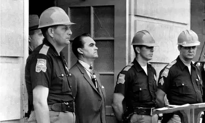  ??  ?? Alabama governor George Wallace blocked the entrance to the University of Alabama to prevent black students from enrolling, 1963. Photograph: AP