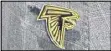  ?? AP ?? Falcons owner Arthur Blank “pinned” his new running back with this lapel logo.