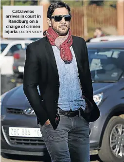  ?? /ALON SKUY ?? Catzavelos arrives in court in Randburg on a charge of crimen injuria.