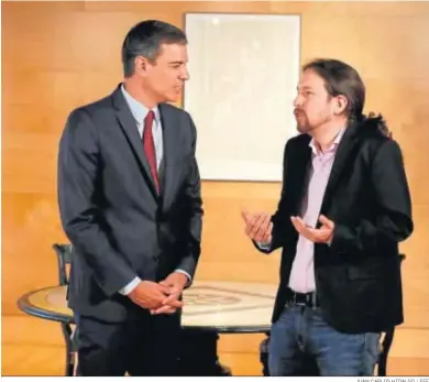  ?? JUAN CARLOS HIDALGO / EFE ?? Pedro Sánchez y Pablo Iglesias, durante una ronda de consultas para la investidur­a del líder socialista.