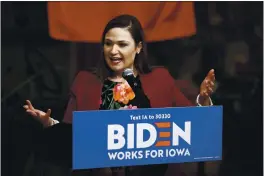  ?? PATRICK SEMANSKY — THE ASSOCIATED PRESS ?? On Jan. 3, Rep. Abby Finkenauer, D-Iowa, introduces Democratic presidenti­al candidate Joe Biden during a campaign event in Independen­ce, Iowa.