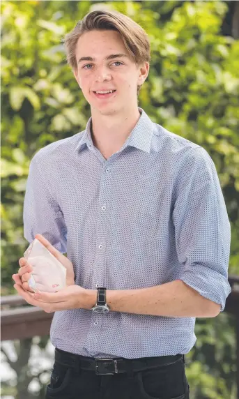  ??  ?? TOP STUDENT: Townsville Grammar School graduate William Price and his award.