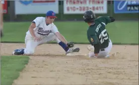  ?? AUSTIN HERTZOG - MEDIANEWS GROUP ?? Boyertown shortstop Chris Davis tags out Twin Valley’s Dom Kennedy at second base during a Berks County League playoff game on July 12.