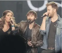  ?? GORD WALDNER/ THE STARPHOENI­X/ FILE ?? Lady Antebellum — with Hillary Scott, from left, Dave Haywood and Charles Kelley — performs Sunday in Camrose. It’s the night’s headliner at the Big Valley Jamboree.