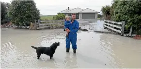  ?? PHOTOS: JOHN BISSET/STUFF ?? Top, farmland east of State Highway 1 flooded by the Rangitata River, the main flow of which can be seen in the distance upper left; bottom left, Eldon Megaw with son Reid on the road outside their flooded farm; bottom right, the safest means of travel around the Rangitata’s flooded roads.