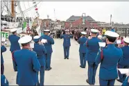  ?? SEAN D. ELLIOT/THE DAY ?? The United States Coast Guard Band plays the Mexican national anthem on City Pier.