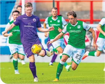  ??  ?? Hibs scorer Scott Allan (right) and Stirling Albion’s Dominic Docherty