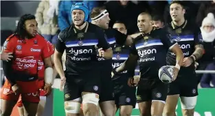  ??  ?? Thanks Chris: Jonathan Joseph celebrates with team mates after scoring a try following a mistake by Toulon’s Chris Ashton