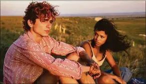  ?? Yannis Drakoulidi­s / Metro Goldwyn Mayer Pictures ?? Timothée Chalamet, left, and Taylor Russell in director Luca Guadagnino’s “Bones and All,” based on the young-adult novel by Camille DeAngelis.