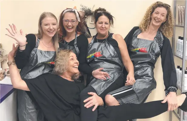  ??  ?? HAIR FOR YOU: Meraki Curlz owner Lyn Hutchinson (seated) with Georgia White, Kylie McCosker, Sharon Wagner and Vicki McDonald.