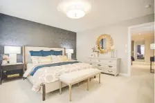  ??  ?? Broadview Homes’ Aria II offers two master bedrooms on the second floor.