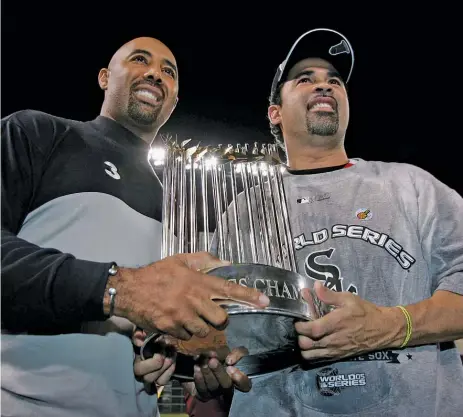  ?? ELSA/GETTY IMAGES ?? Harold Baines celebrates the White Sox’ 2005 World Series championsh­ip with manager Ozzie Guillen. Baines was Guillen’s bench coach.