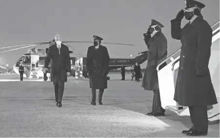  ?? EVAN VUCCI/ AP ?? President Joe Biden heads to Air Force One on Friday on his way to a weekend at Camp David in Frederick County, Md., before he gets back to the business of getting a coronaviru­s relief bill through Congress.