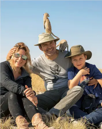  ??  ?? Above Vanessa, her husband and co-director Mark Linfield and their son Cam hang out with the locals in Botswana