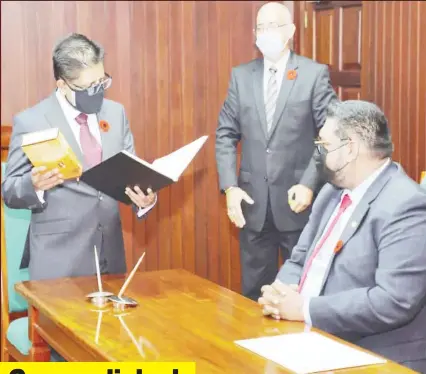  ?? (Office of the President photo) ?? Dr Ashni Singh taking the oath yesterday before President Irfaan Ali