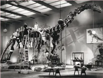  ?? Warner Home Video 1938 ?? Katharine Hepburn and Cary Grant atop a dinosaur in “Bringing Up Baby."