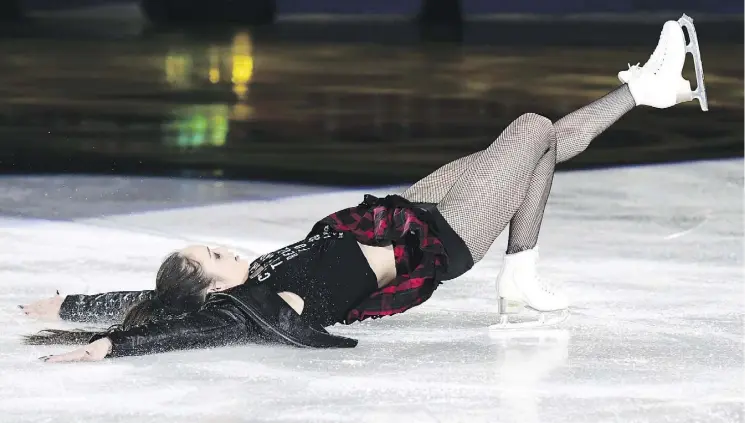  ?? MIGUEL MEDINA/AFP/GETTY IMAGES ?? Kaetlyn Osmond has been on tour with Stars on Ice since winning the women’s world championsh­ip and has been skating to wild applause every night.