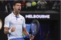  ?? ASANKA BRENDON RATNAYAKE — THE ASSOCIATED PRESS ?? Novak Djokovic of Serbia reacts during his fourth round match against Adrian Mannarino of France at the Australian Open tennis championsh­ips at Melbourne Park, Melbourne, Australia, Sunday.