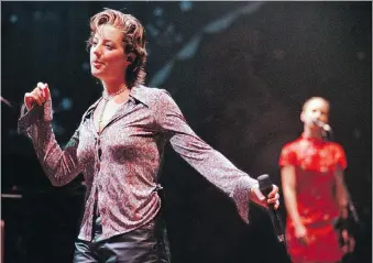  ?? THE ASSOCIATED PRESS/FILES ?? Canadian singer-songwriter Sarah McLachlan, seen at a 1997 Lilith Fair concert in Mountain View, Calif., says her hit album Surfacing, which turns 20 this year, “has great legs.”