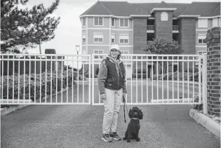  ?? KRISTEN ZEIS/STAFF ?? Mary Sykes stands by the gate of her former home at Ocean Shore Condominiu­m. Virginia Beach City Council will consider allowing Westminste­r-Canterbury on Chesapeake Bay, a retirement community, to build a 22story independen­t living building and a seven-story health care building near the condos.