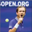  ?? Seth Wenig / Associated Press ?? Daniil Medvedev reacts after scoring a point against Felix Auger-Aliassime during the U.S. Open semifinals on Friday.