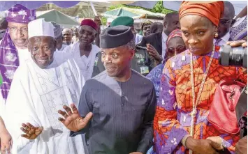  ??  ?? Kano State Governor, Abdullahi Ganduje (left); Vice President Yemi Osinbajo and Executive Director, Bank of Industry (BOI), Mrs. Toyin Adeniji; during an interactiv­e session with GEEP Marketmoni beneficiar­ies in Kano… yesterday