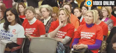  ?? STAFF PHOTOS BY PATRICK WHITTEMORE; BELOW RIGHT, COURTESY PHOTO ?? ‘COWARDLY’ CONGRESS: Advocates, above, gather yesterday to listen to Attorney General Maura Healey, left, and others at a rally at the State House. Attending the event was Westford resident Jody Marchand, below left. Marchand sheds tears as she talks...