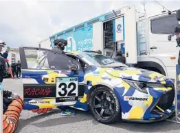  ?? TOYOTA ?? A car with a hydrogen combustion engine is refueled July 31 during a race in Hita, Japan. Toyota is testing the engines with an eye on using the technology commercial­ly.