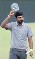  ?? AFP ?? Sahith Theegala reacts to his putt on the 18th green.