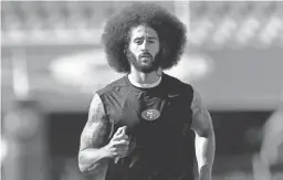  ??  ?? Former San Francisco 49ers quarterbac­k Colin Kaepernick warms up before a 2016 game against the Rams. GARY A. VASQUEZ/USA TODAY SPORTS