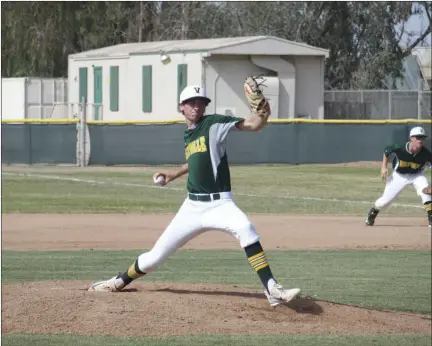  ?? KARINA LOPEZ PHOTO ?? Dylan Cartee delivers a pitch for the Vikings during Holtville High's home game against Mt. Empire on Tuesday afternoon.