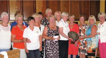  ??  ?? The winning team holding the Founders Trophy, Eastham Lodge, with Captain of Captains, Mrs Sue Queeding (fourth from right).