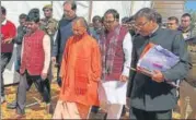  ?? HT ?? Chief minister Yogi Adityanath, along with state BJP chiefMahen­dra Nath Pandey and UP minister Mohsin Raza, on Thursday inspected the site where the PM is scheduled to hold a rally.