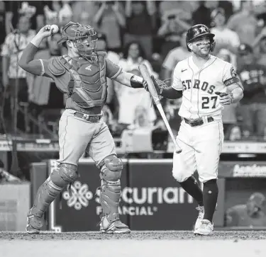  ?? Karen Warren / Staff photograph­er ?? Jose Altuve came to bat with two Astros in scoring position but was unable to rally his team and struck out for the third time. Angels pitchers struck out 10 Astros hitters, and starter Jose Suarez recorded seven.