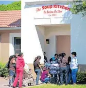  ?? SUN SENTINEL STAFF PHOTO BY MARK RANDALL ?? People line up at the Soup Kitchen of Boynton Beach, which is celebratin­g its 30th anniversar­y.