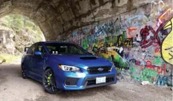  ?? SAMI HAJ-ASSAAD/AUTOGUIDE.COM ?? The 2018 Subaru WRX STI is a blast to drive, packing new brakes and cooling to improve its performanc­e.