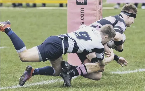  ??  ?? David Corbenici scores a try for Ayr in their 29-23 victory over Heriot’s in last month’s Premiershi­p final.