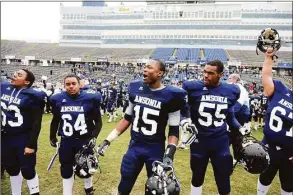  ?? Autumn Driscoll / Hearst Connecticu­t Media ?? Ansonia celebrates its 59-26 win over North Branford in the 2012 Class S championsh­ip game at Rentschler Field in East Hartford.