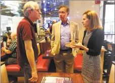  ?? Kaitlyn Krasselt / Hearst Connecticu­t Media ?? Greenwich businessma­n Ned Lamont, center, the endorsed Democratic candidate for governor, and former secretary of the state Susan Bysiewicz, who was endorsed for lieutenant governor, speak with Patrick Vingo, left, a Norwalk resident and vice president...